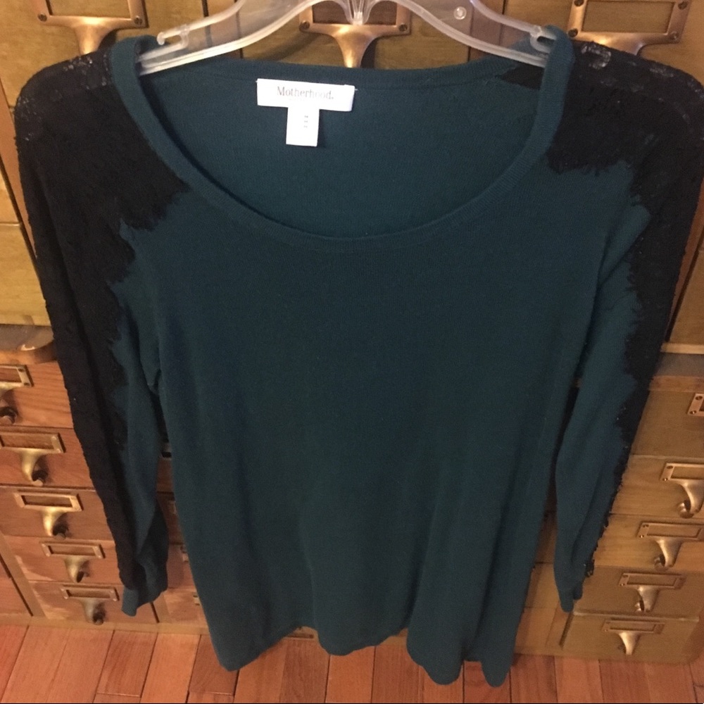 Green maternity sweater.